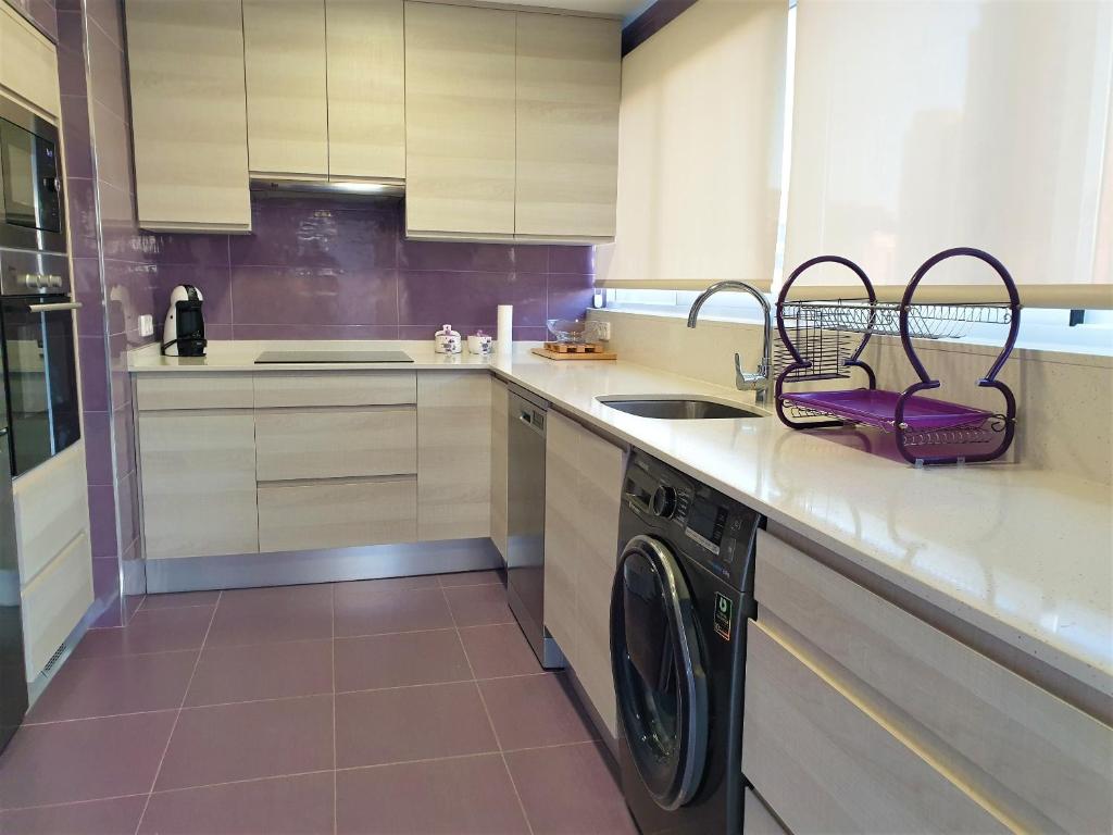 A kitchen or kitchenette at COBLANCA 3 by Apturist