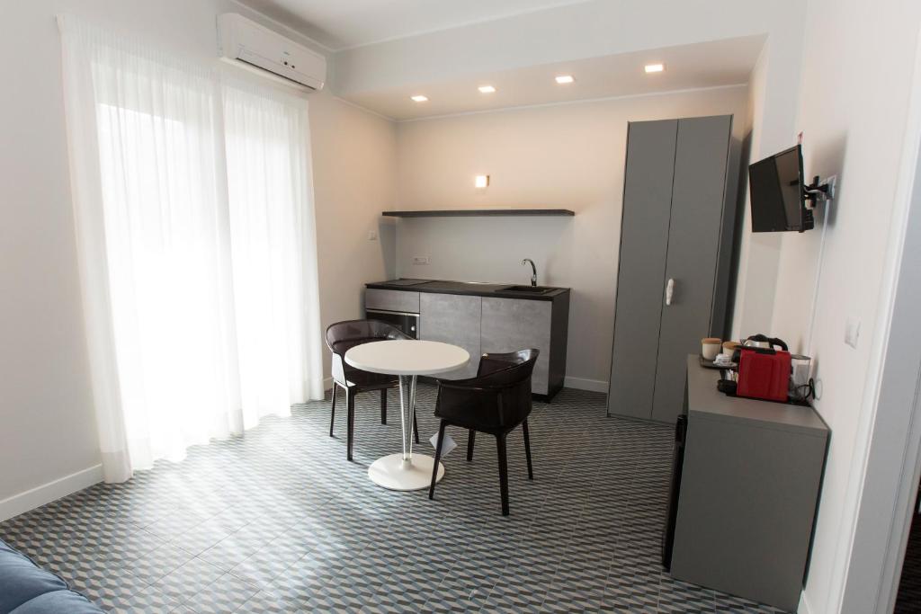 Kuchyň nebo kuchyňský kout v ubytování Malù Suites