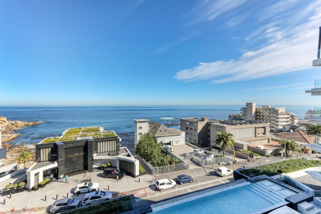 a view of the ocean from a building at Aurum Allure Apartment - Bantry Bay in Cape Town