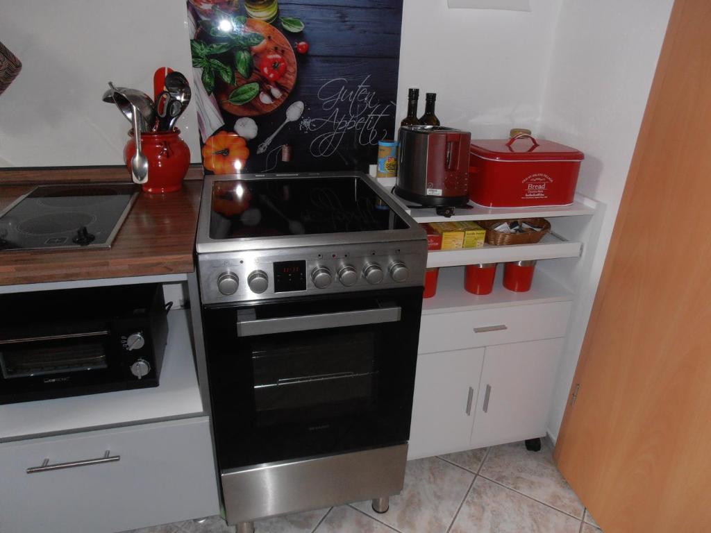 Kuchyň nebo kuchyňský kout v ubytování Schöne Moderne Wohnung