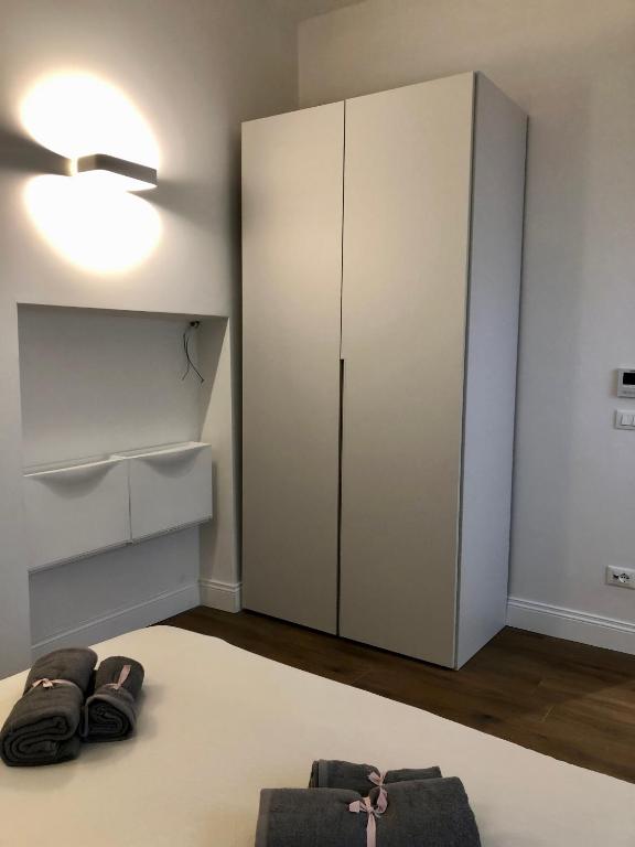 A bed or beds in a room at Novella Suite