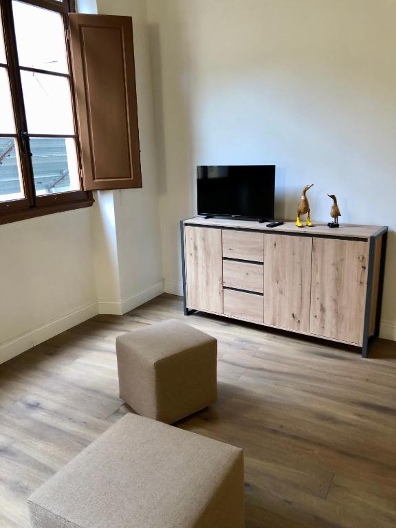 A television and/or entertainment centre at Novella Suite