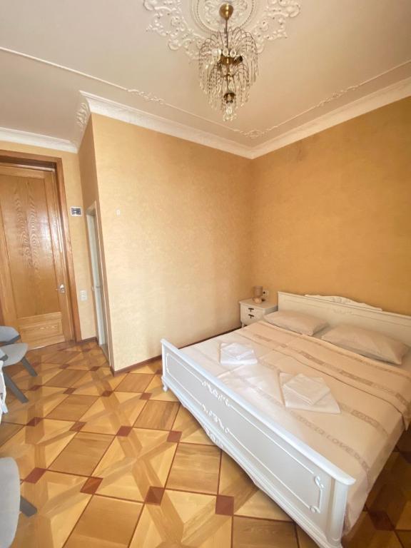 Postel nebo postele na pokoji v ubytování K&N Guesthouse