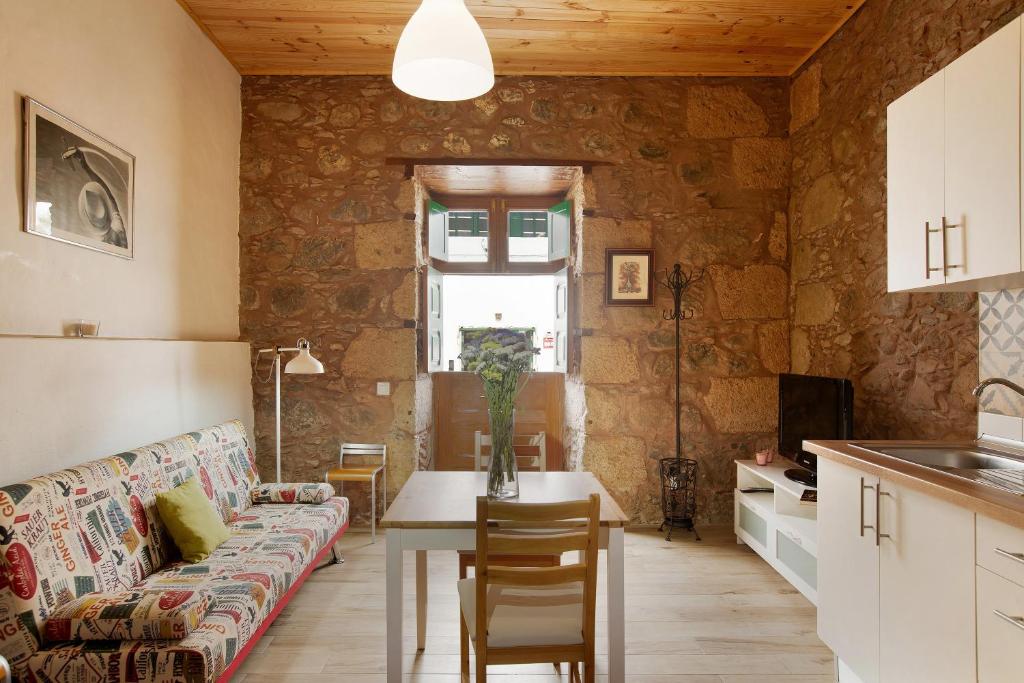 a living room with a couch and a table at Casa Mamayana in Telde