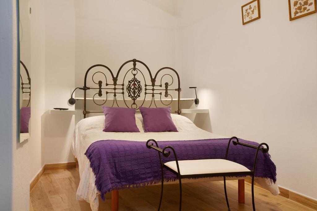 A bed or beds in a room at Casa Mamayana