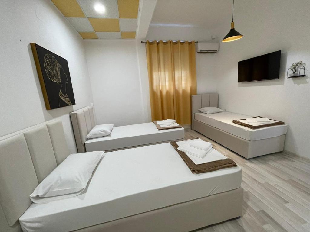 Postel nebo postele na pokoji v ubytování Hostel Izvor