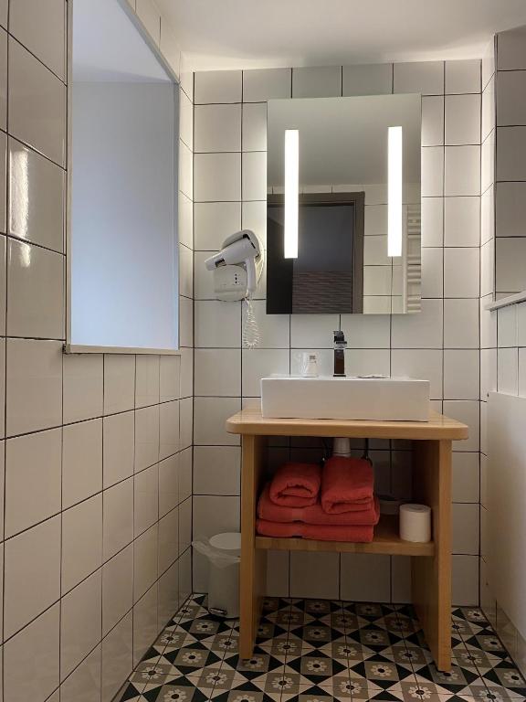 Koupelna v ubytování Hotel Au Cerf