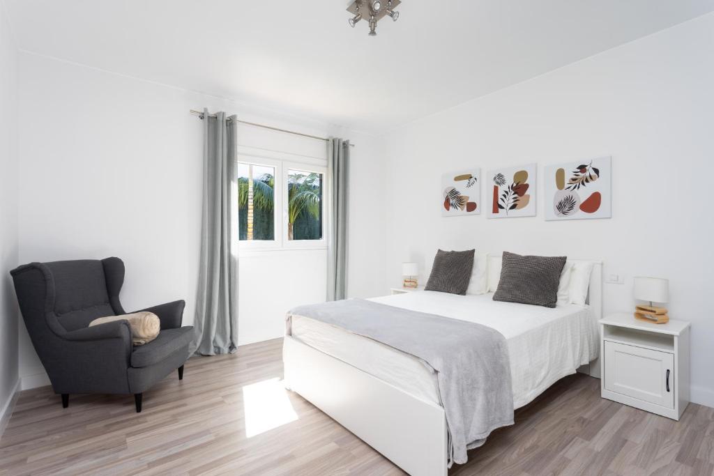 Posteľ alebo postele v izbe v ubytovaní Home2Book Design Asian Sabina, Heated Pool & View