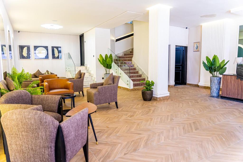 Posezení v ubytování Hotel Les Ambassadeurs