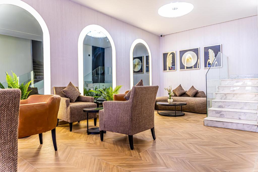 Posezení v ubytování Hotel Les Ambassadeurs