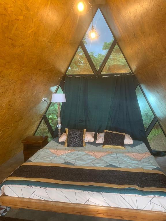 Postel nebo postele na pokoji v ubytování Chalets Resort Masinagudi