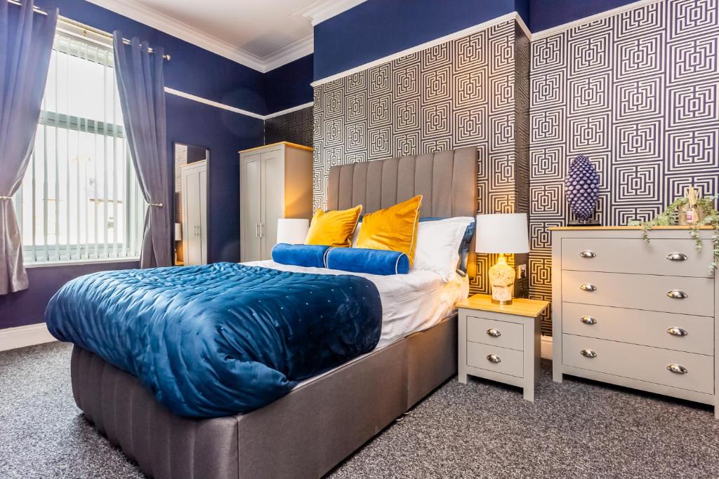 Ein Bett oder Betten in einem Zimmer der Unterkunft Comfy-Stays - Lower Ocean Road