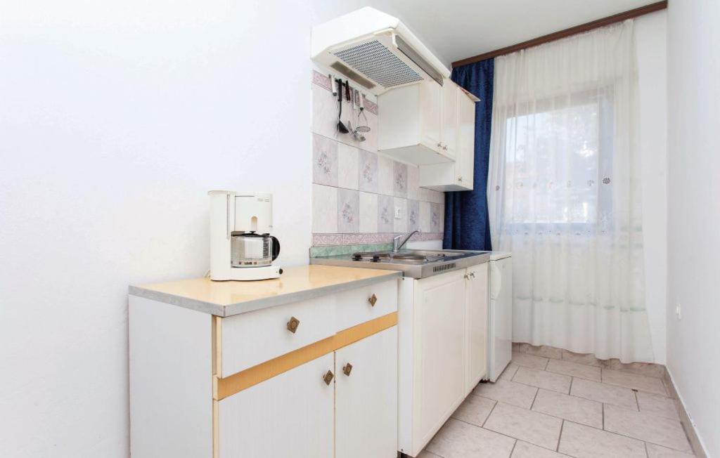Kuchnia lub aneks kuchenny w obiekcie Apartmani Mile