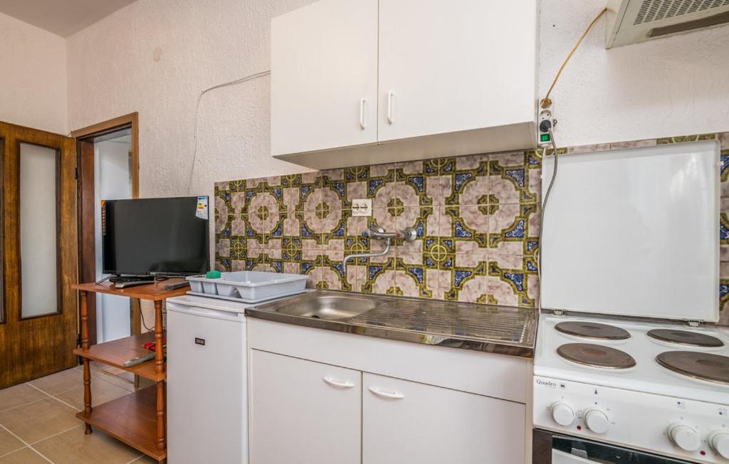 Kuchnia lub aneks kuchenny w obiekcie Apartmani Mile