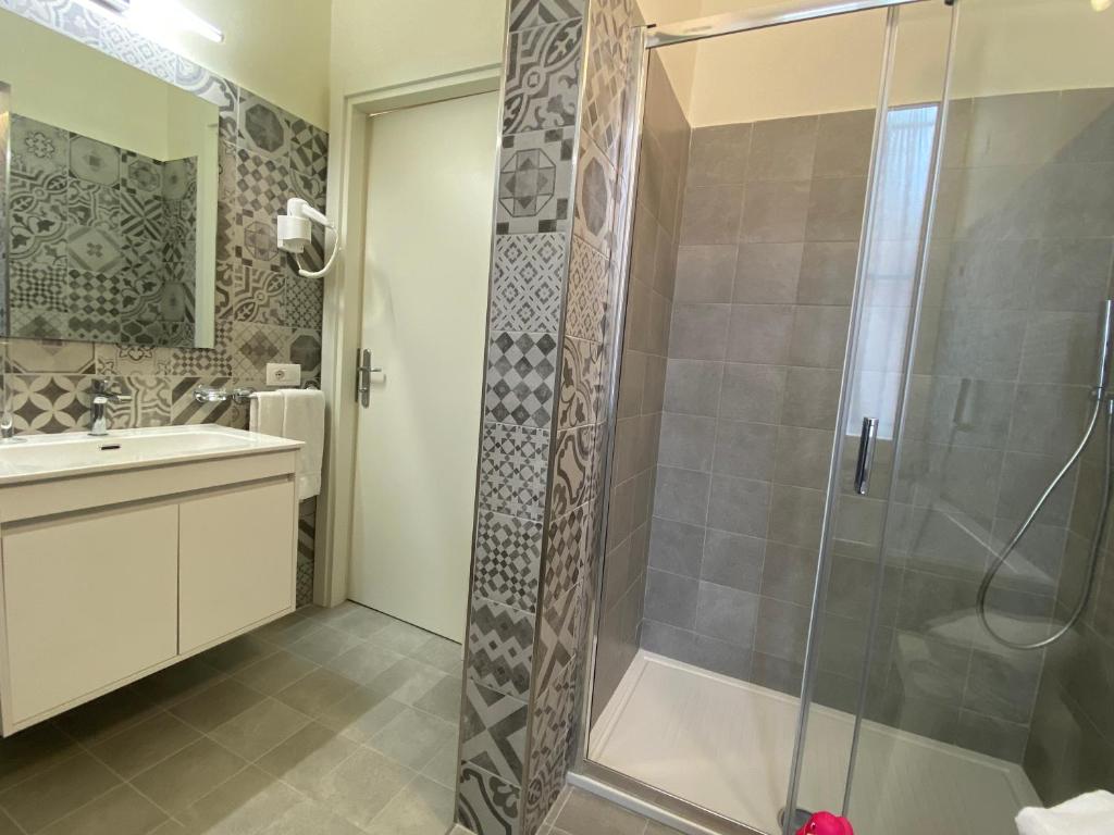 Koupelna v ubytování Hotel Eletto
