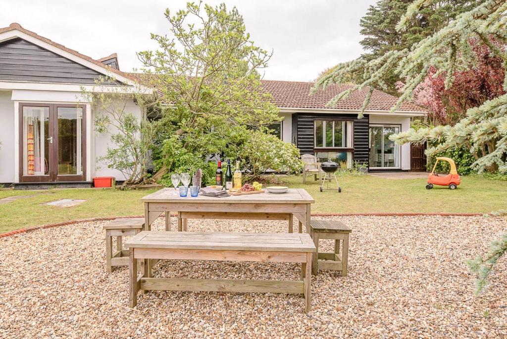 a picnic table in the backyard of a house at Sea Poppies in Thorpeness