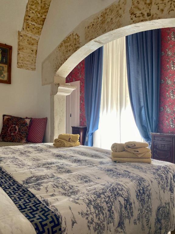 Postel nebo postele na pokoji v ubytování Villa in Gargano - VILLA BASSO