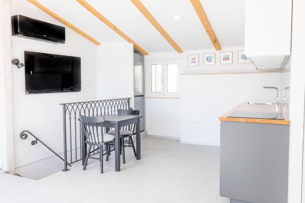 Kuchyňa alebo kuchynka v ubytovaní Seafront Baska Apartment