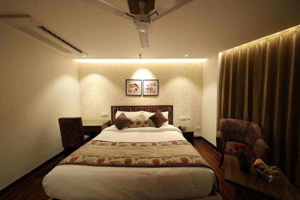 Postel nebo postele na pokoji v ubytování juSTa Grand View Resort & Spa, Manali
