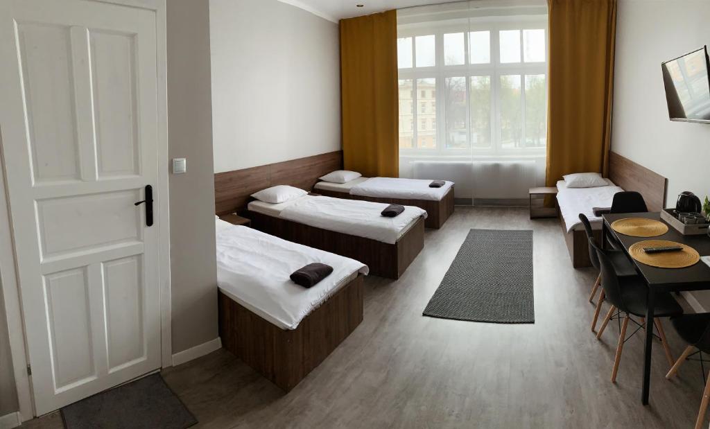 Posteľ alebo postele v izbe v ubytovaní Noclegi Comfort - Self Check-in 24h