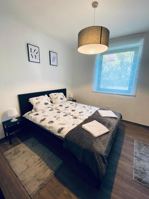 Postel nebo postele na pokoji v ubytování Villa007