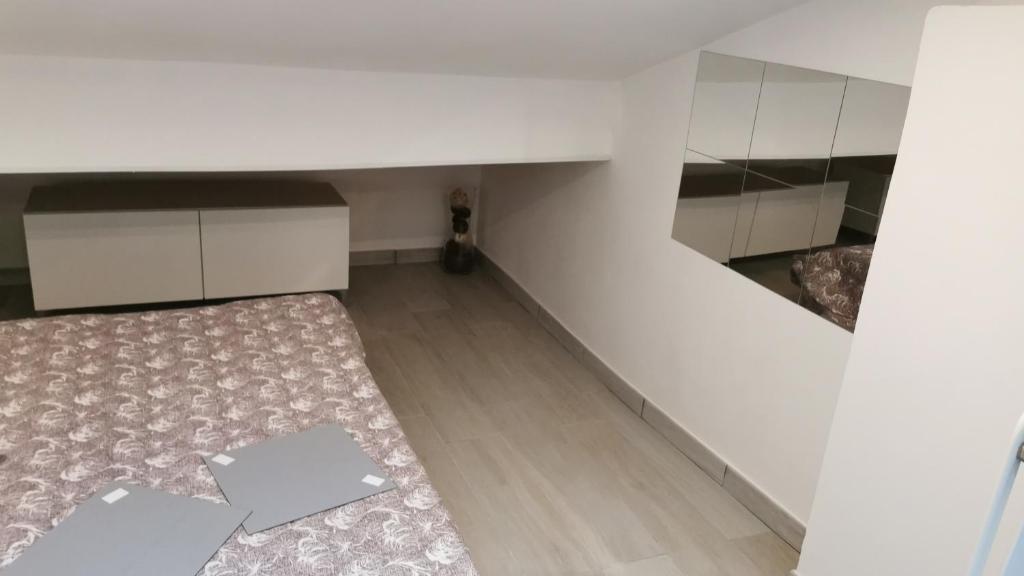 A kitchen or kitchenette at Alle Mansarde