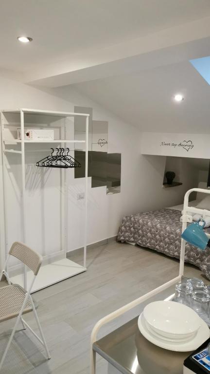 A kitchen or kitchenette at Alle Mansarde