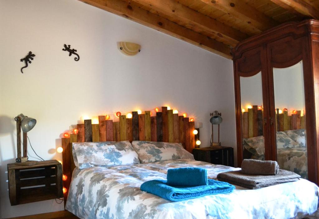 Postel nebo postele na pokoji v ubytování Casa rural La abuela Nines