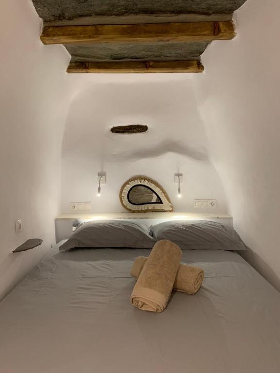 Postel nebo postele na pokoji v ubytování Serenity Living Platia, Tinos