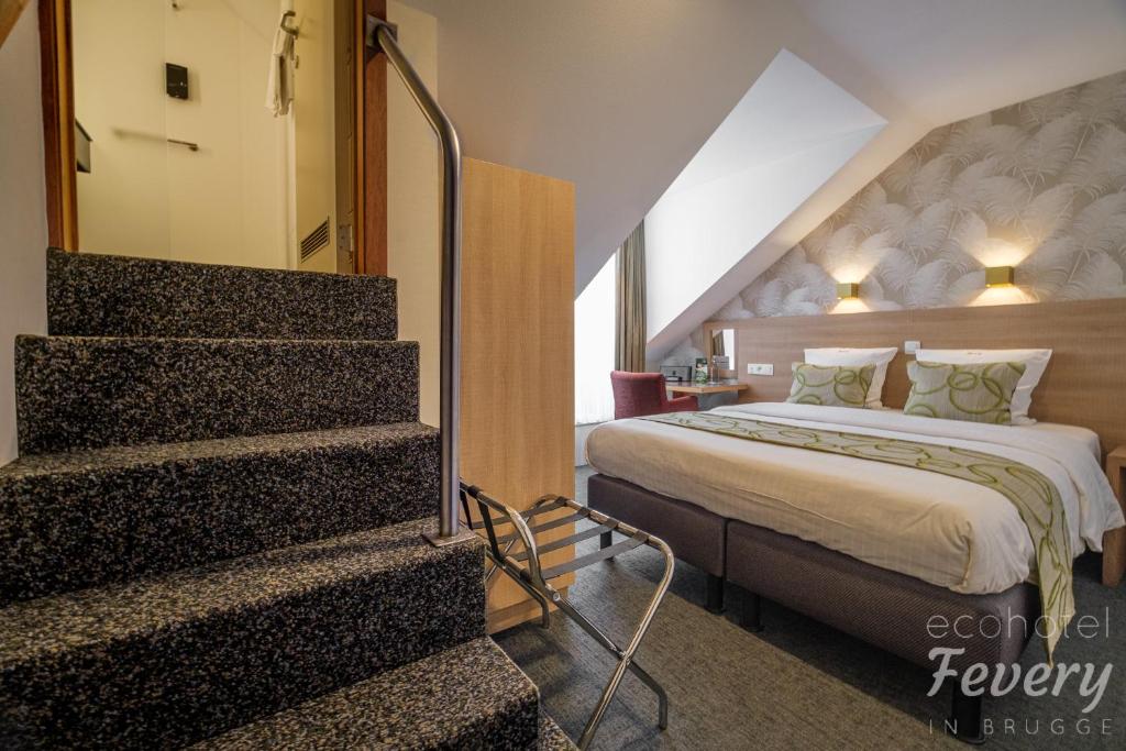 Postel nebo postele na pokoji v ubytování Hotel Fevery