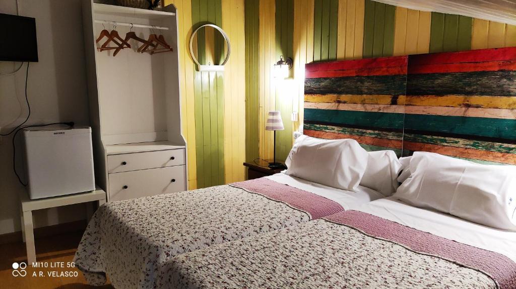 Postel nebo postele na pokoji v ubytování Hostal Martin - Sanabria