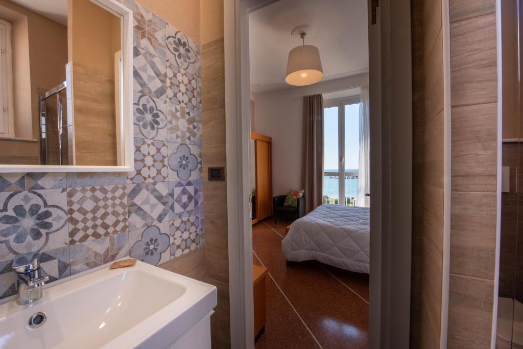 Koupelna v ubytování Hotel Tigullio