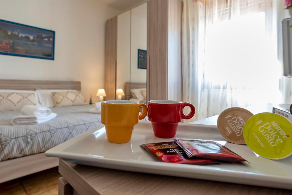 Postel nebo postele na pokoji v ubytování Sardinia rooms
