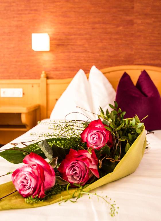 Postel nebo postele na pokoji v ubytování Landhotel Drei Eichen