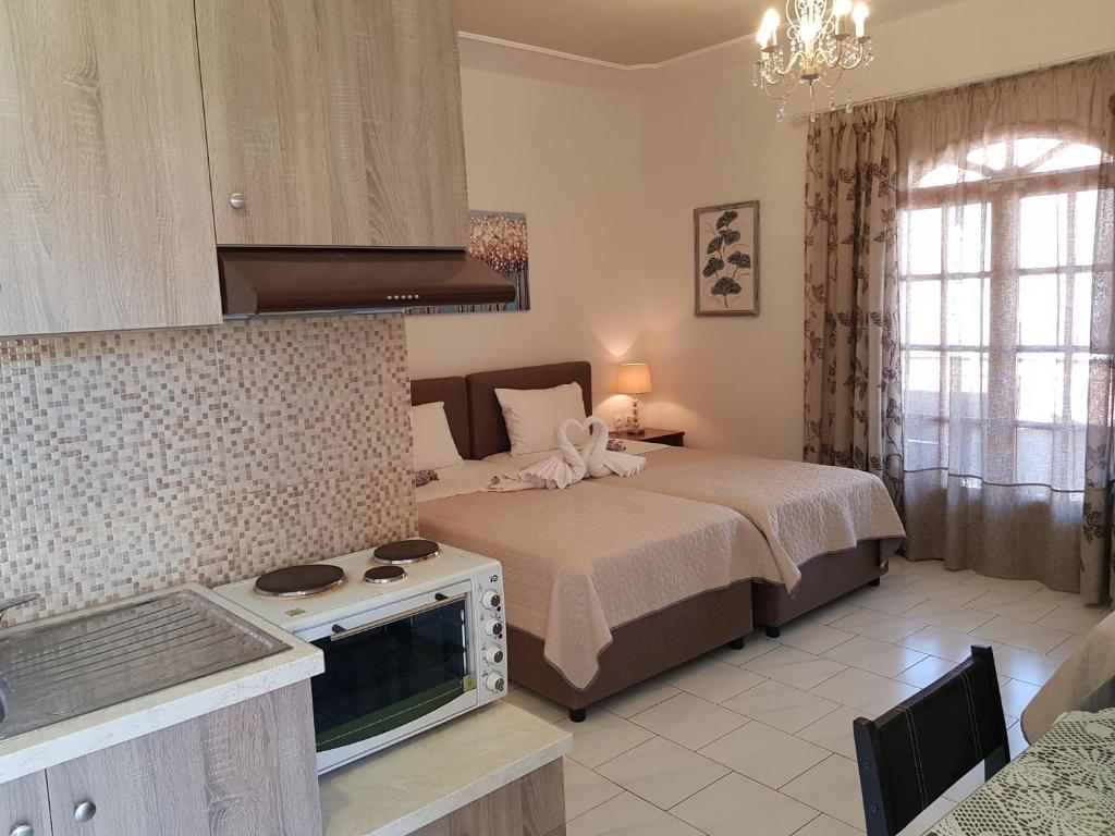 Kuchyň nebo kuchyňský kout v ubytování Virvilis Apartments