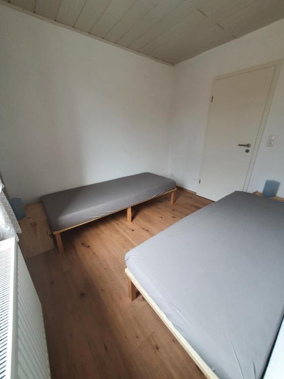 Postel nebo postele na pokoji v ubytování Ferienwohnung Hofmann
