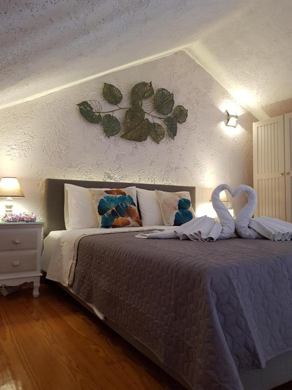Postel nebo postele na pokoji v ubytování Virvilis Apartments