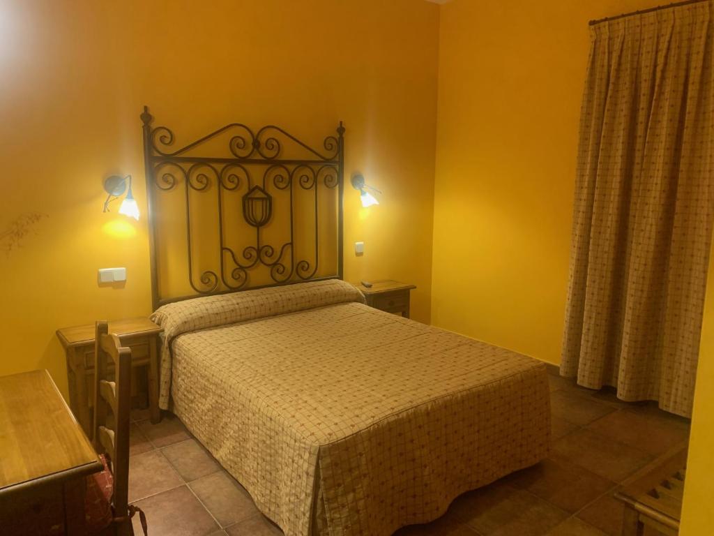 Postel nebo postele na pokoji v ubytování Hotel Langa