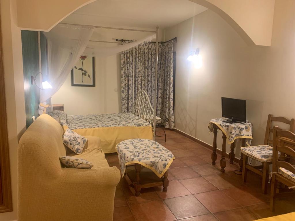Postel nebo postele na pokoji v ubytování Hotel Langa