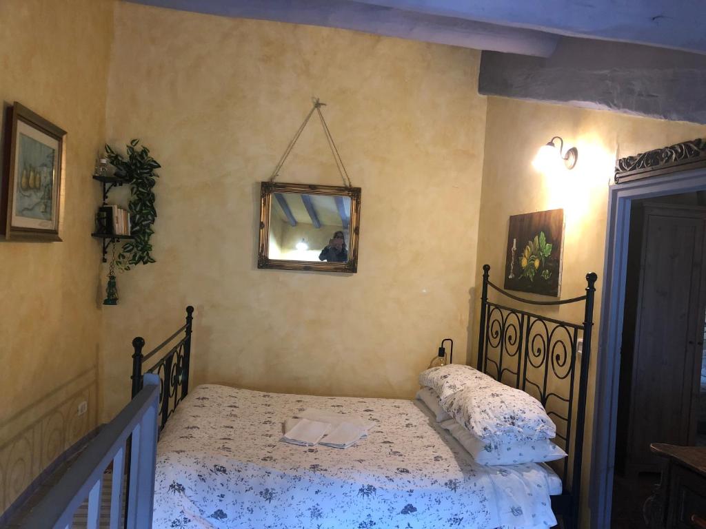 A bed or beds in a room at Maison Dina