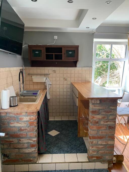 Kuchyňa alebo kuchynka v ubytovaní Apartament Krasińskiego 5 - Park
