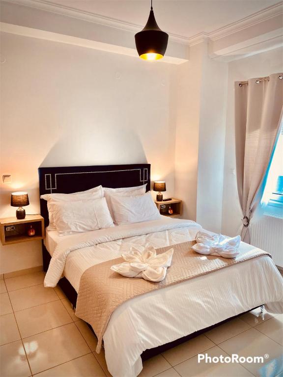 Postel nebo postele na pokoji v ubytování 4SEASONS Apartment
