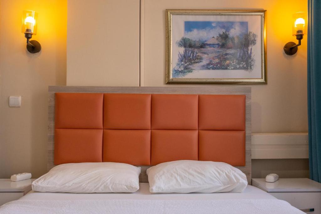 Postel nebo postele na pokoji v ubytování Arden Hotel