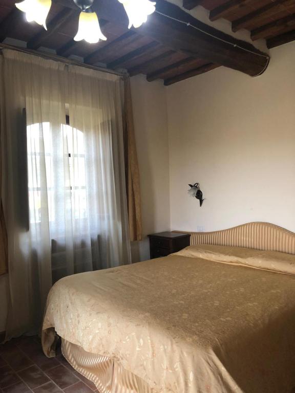 Posteľ alebo postele v izbe v ubytovaní La casina di Helen