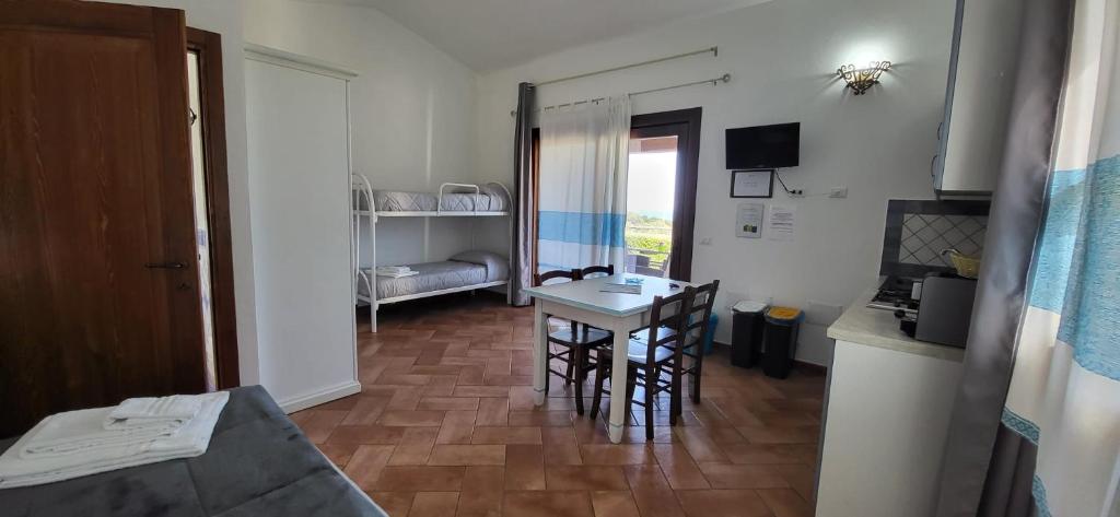 Postel nebo postele na pokoji v ubytování Agriturismo Su Barcu