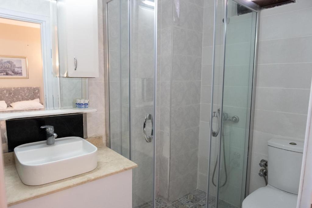 Koupelna v ubytování Arden Hotel