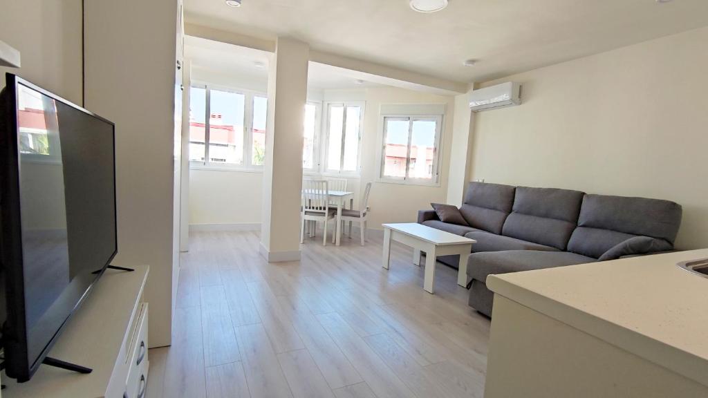 Televízia a/alebo spoločenská miestnosť v ubytovaní Gaviotas Beach - Alojamientos La Torre