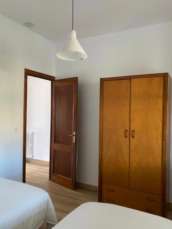 Posteľ alebo postele v izbe v ubytovaní Casa Morín, apartamento Ribeira Sacra