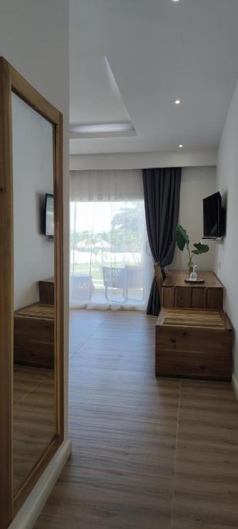 Postel nebo postele na pokoji v ubytování Hotel El Quemaito - Luxury Oceanfront Retreat