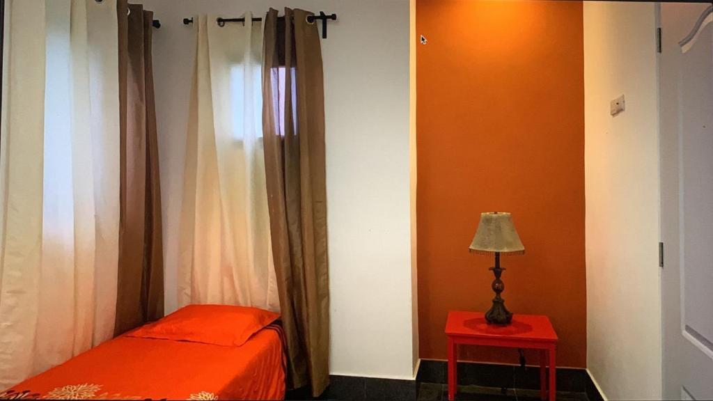 Postel nebo postele na pokoji v ubytování Manaya Bed & Breakfast